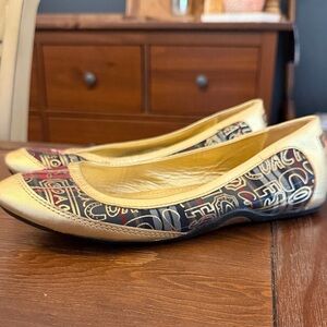 Coach Black and Gold Women's Flats